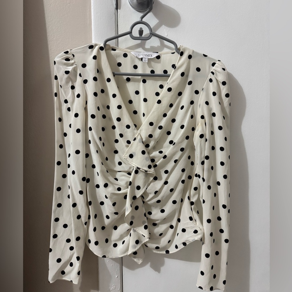 Intermix blouse white polka dots .